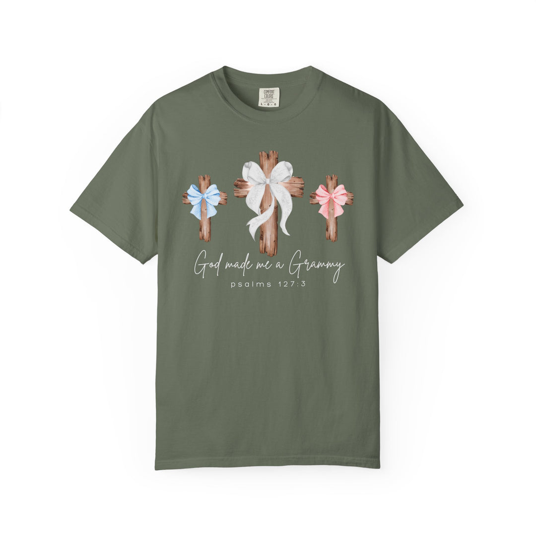 Olive-green “God Made Me a Grammy” tee features three rustic wooden crosses with bows and Psalm 127:3, crafted from soft, durable Comfort Colors cotton.