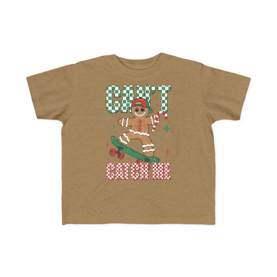 Can't Catch Me Toddler Tee featuring a gingerbread skateboarder with a candy cane, checkerboard text, and soft, durable fabric ideal for toddlers.