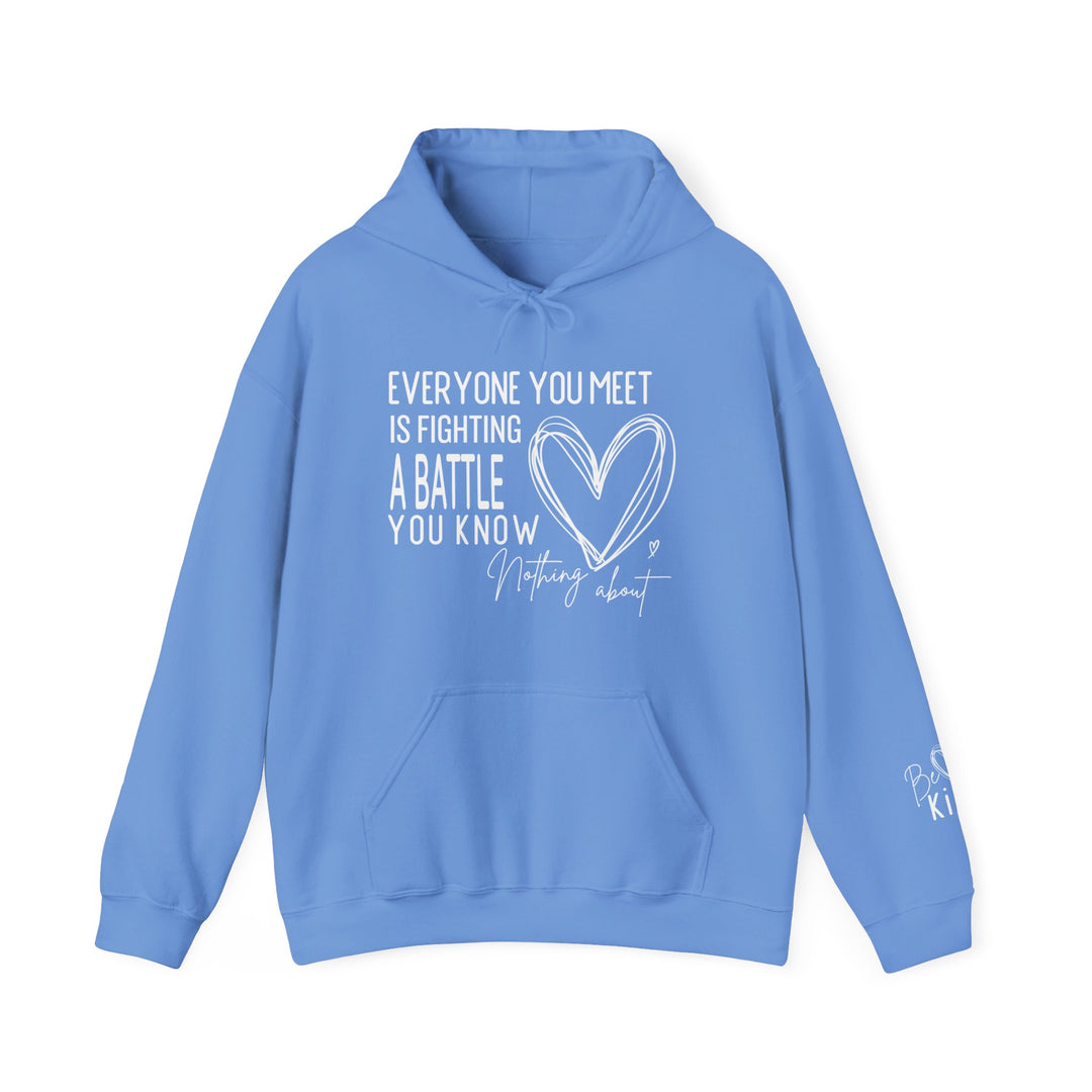 Light blue Fighting a Battle hoodie with a heart graphic and Be Kind sleeve script, featuring a front pouch and drawstring hood.