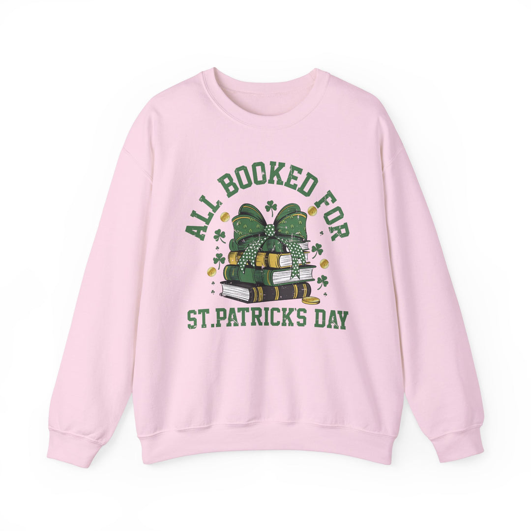 Booked Up for St. Patrick's Day Crew: Pink sweatshirt with green text, unisex, comfortable blend, ribbed collar, no side seams, true to size, medium-heavy fabric.