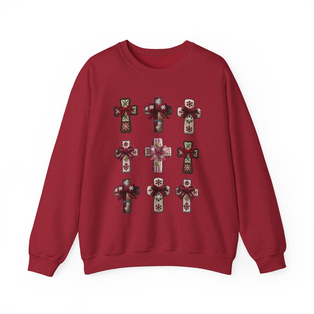 Red crew-neck sweatshirt featuring a festive 3x3 grid of decorative cross motifs with knit-style patterns and bows, offering cozy holiday style from Faith Family Designs.