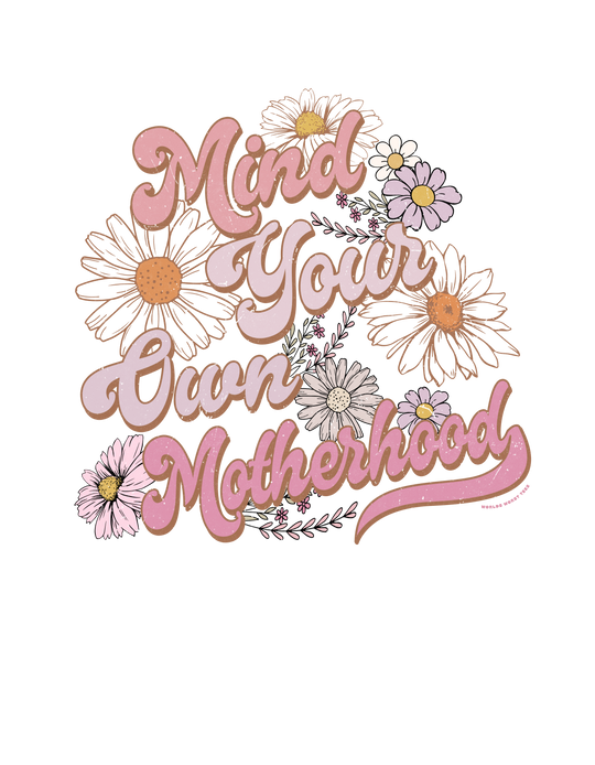 A black tee with floral typography design, crafted from 100% ring-spun cotton. Soft-washed and garment-dyed for coziness, featuring a relaxed fit and durable double-needle stitching. Mind Your Motherhood Tee by Worlds Worst Tees.