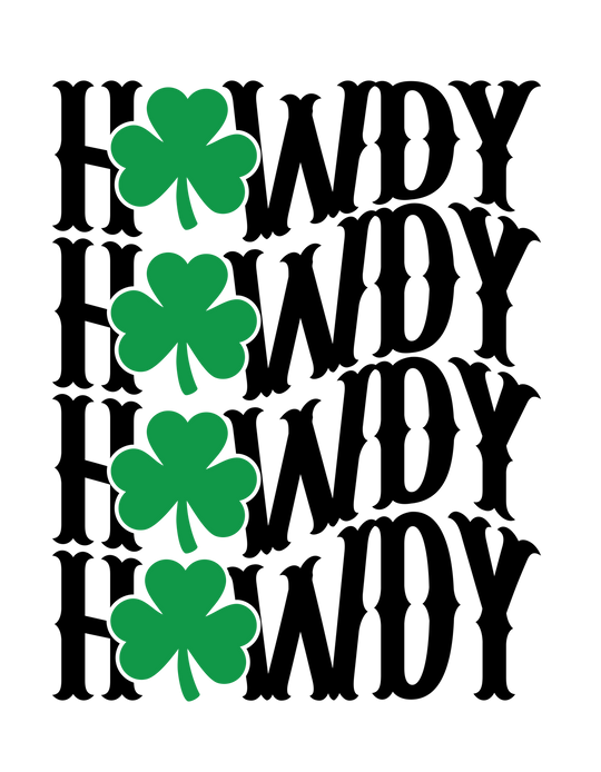 Howdy Lucky Tee featuring green shamrocks on black background, offering a soft, comfortable fit with ribbed knit collars and durable dual side seams.