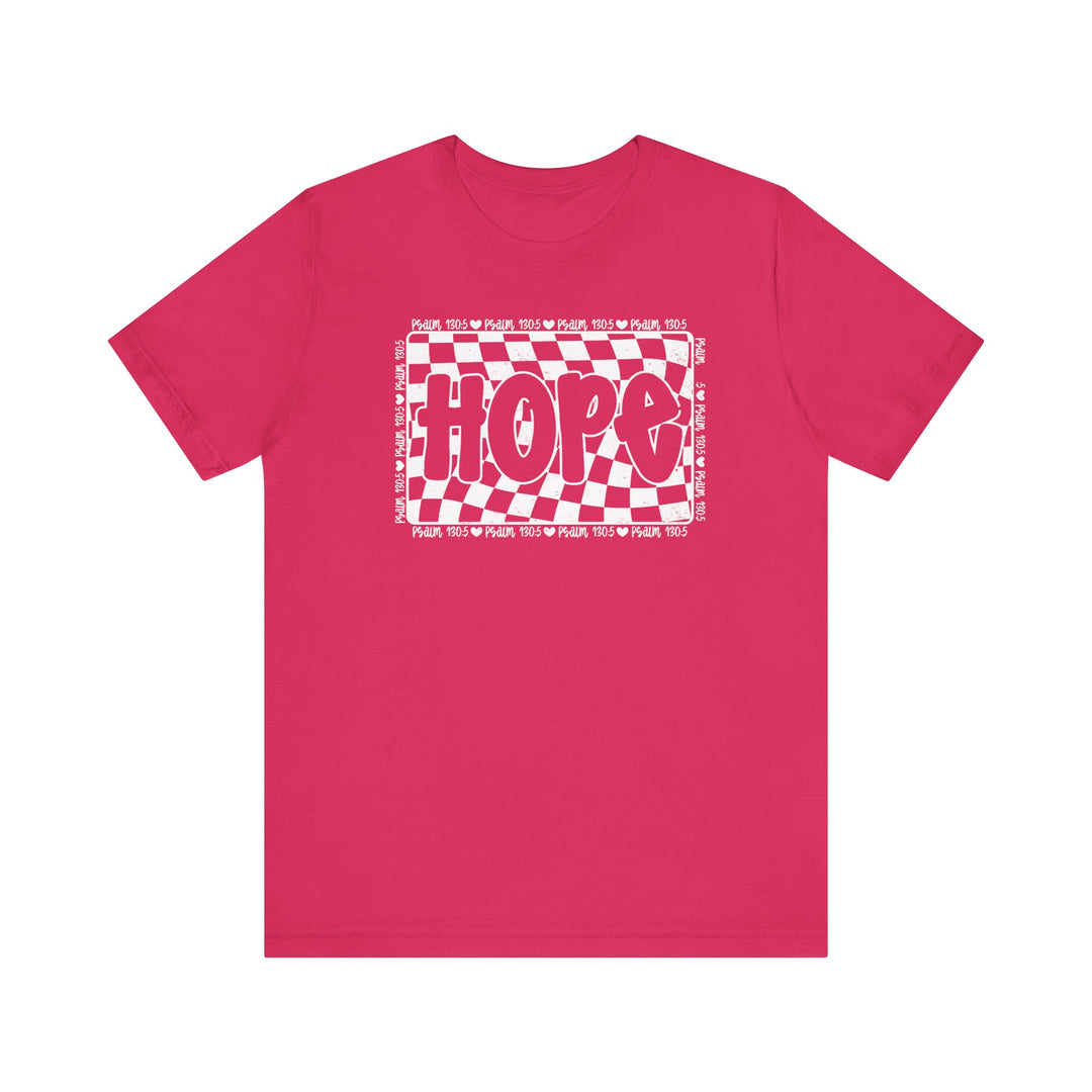 Hope Tee: A pink t-shirt featuring a white and red design, with a classic unisex fit and ribbed knit collars for durability.