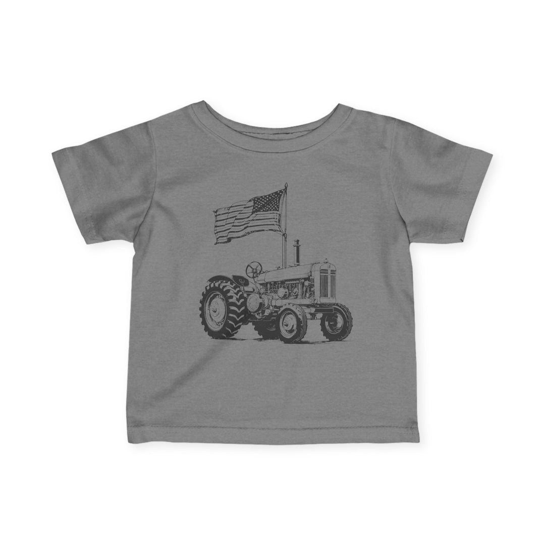 American Boy Baby Tee: Heather-gray children's T-shirt featuring a black line-drawing of a vintage farm tractor with an American flag. Perfect blend of comfort and durability.