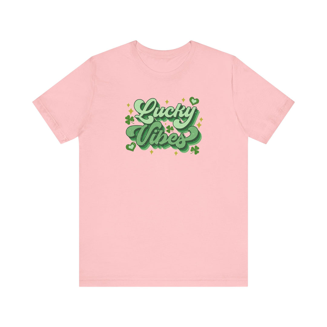 Good Day Lucky Day Tee: Pink jersey short sleeve t-shirt featuring green text. Soft cotton, ribbed knit collar, and dual side seams for lasting shape.