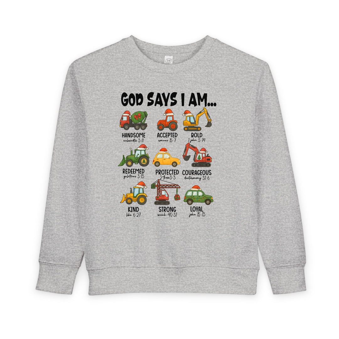 God Says Christmas Truck Toddler Crew: Light-gray sweatshirt featuring Santa-hatted cartoon construction vehicles with positive attributes and Bible references, blending comfort and festive faith.