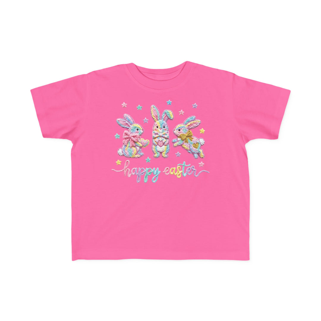 Easter Bunny Toddler Tee: Bright pink shirt with pastel bunnies and happy easter script, perfect for toddlers; soft cotton, durable print, classic fit.