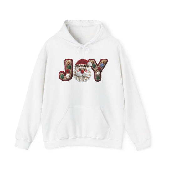 White Joy Hoodie with chenille-style JOY embroidery featuring a Santa face, Christmas-themed colors, kangaroo pocket, ribbed cuffs, and adjustable hood. Perfect for cozy, festive wear.
