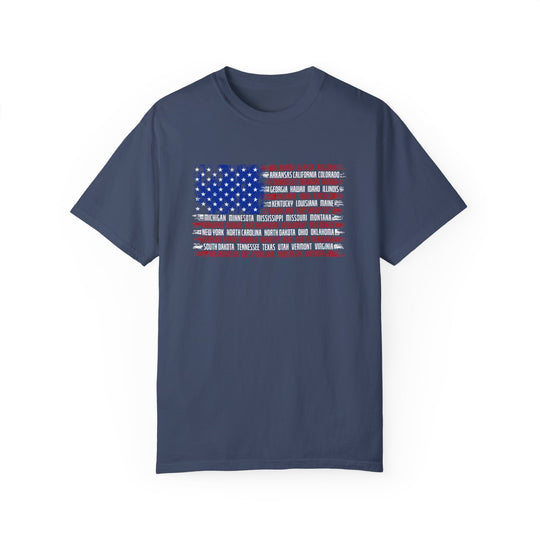 A relaxed fit State Flag Tee, crafted from 100% ring-spun cotton. Garment-dyed for extra coziness, featuring double-needle stitching for durability and a seamless design for a tubular shape.