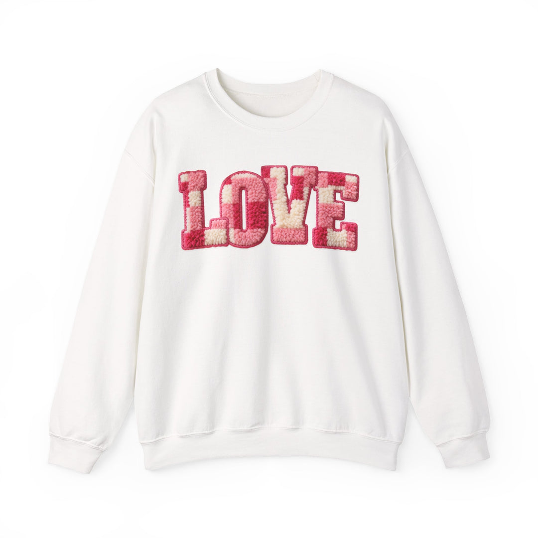 White Love Crew sweatshirt with plush chenille LOVE letters in pink and cream, reflecting Faith Family Designs' cozy, trendy style.