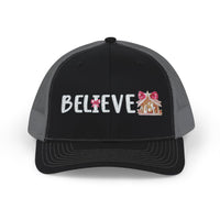 Believe Snapback Trucker Cap features a glittery 'BELIEVE' text with candy-cane ornament and gingerbread house, offering a stylish, breathable design with adjustable fit.