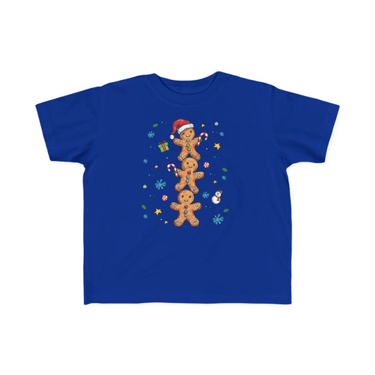 Gingerbread Stack Toddler Tee featuring stacked gingerbread figures, candy canes, snowflakes, and a festive Santa hat design, perfect for holiday celebrations.