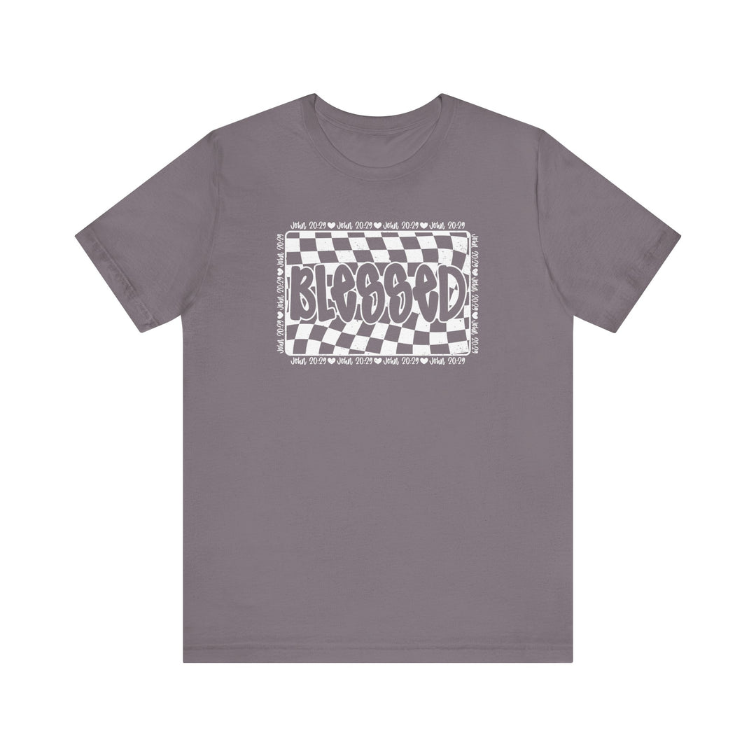 Blessed Tee: Grey t-shirt featuring a checkered design and white text, made of soft cotton with ribbed knit collars and taping for a comfortable fit.