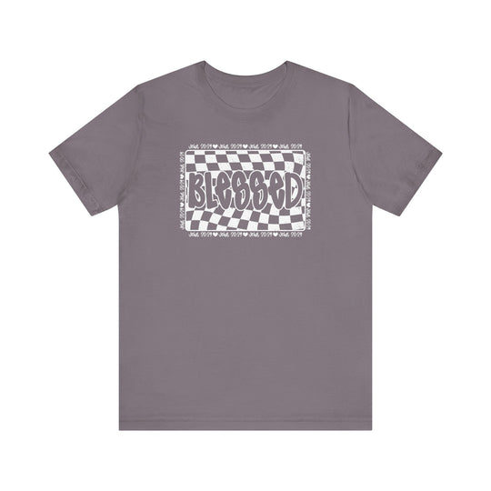 Blessed Tee: Grey t-shirt featuring a checkered design and white text, made of soft cotton with ribbed knit collars and taping for a comfortable fit.