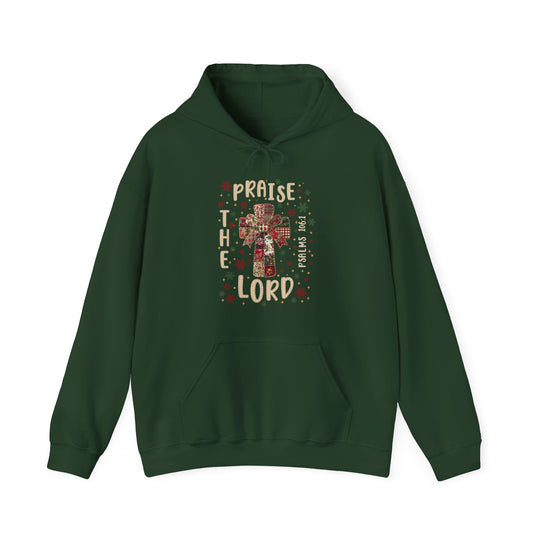 Dark-green hooded sweatshirt featuring a patchwork-style cross with Praise the Lord and Psalms 106:1, emphasizing faith-themed design from Faith Family Designs.