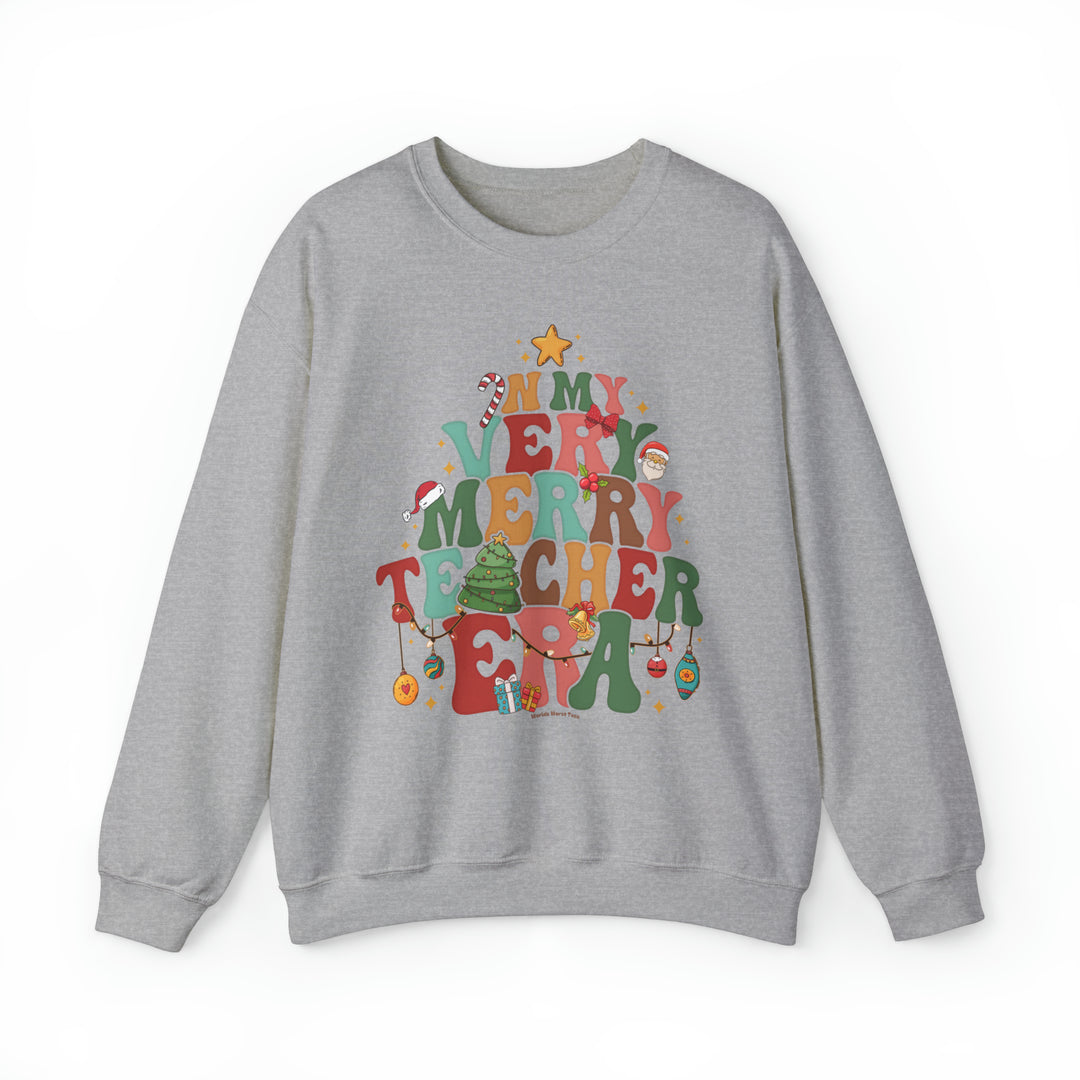 Unisex heavy blend crewneck sweatshirt featuring a graphic design, ideal for comfort. 50% cotton, 50% polyester, ribbed knit collar, loose fit, sewn-in label. Verry Merry Teacher Crew by Worlds Worst Tees.