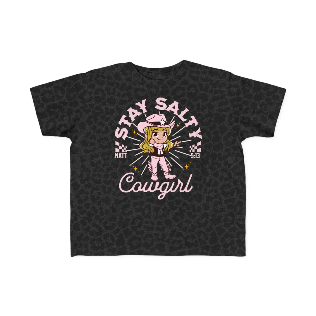 Salty Cowgirl Tee for toddlers, featuring a cartoon girl in a cowboy hat pointing, on a black, soft cotton t-shirt. Perfect for sensitive skin.