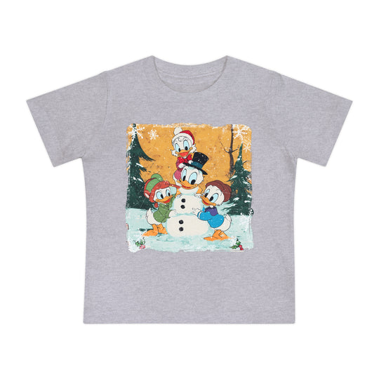 Duck Snowmen Baby Tee: Heather-gray T-shirt with Donald Duck and nephews building a snowman in a snowy forest. Soft, durable, pre-shrunk cotton blend for infants.