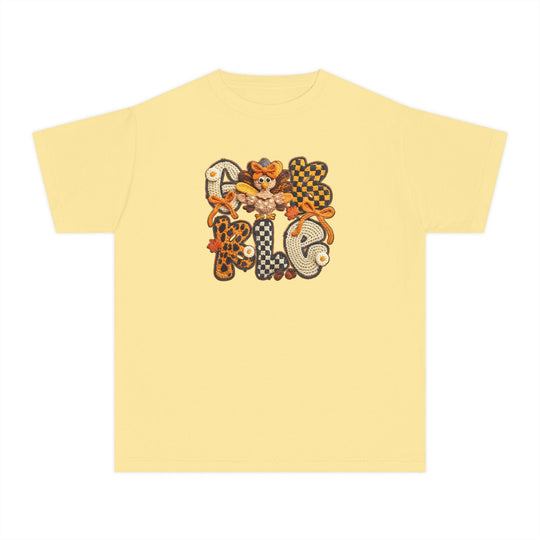 Gobble Kids Tee with fall-themed applique, featuring GOBBLE in various patterns, cartoon turkey, bows, daisies, maple leaves; crafted for comfort with 100% combed cotton.