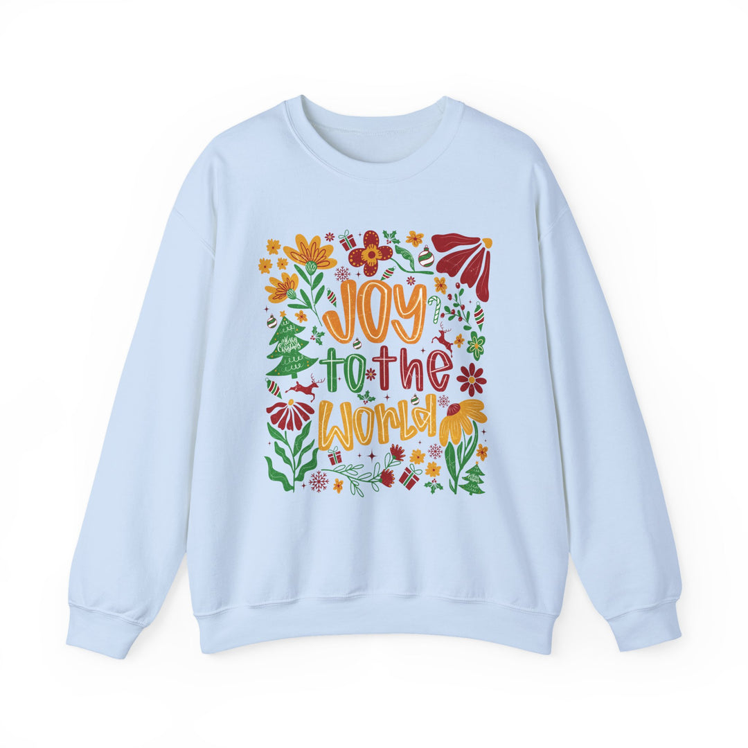 Light-blue crewneck sweatshirt featuring a colorful holiday-themed graphic with Joy to the World in vibrant lettering, ideal for cozy, stylish wear.
