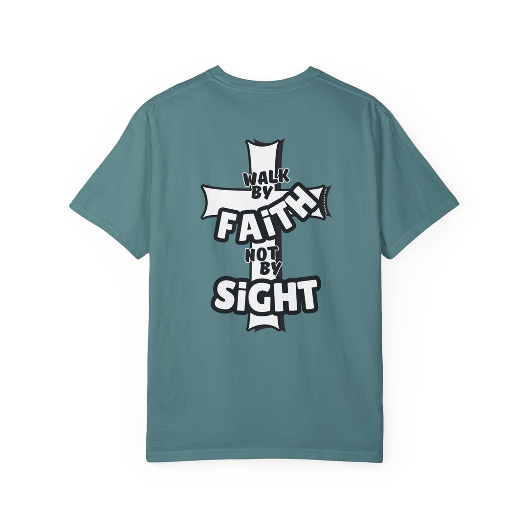 A relaxed fit Walk By Faith Not By Sight Tee, crafted from 100% ring-spun cotton. Garment-dyed for extra coziness, featuring double-needle stitching for durability and a seamless design.