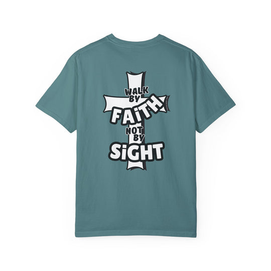 A relaxed fit Walk By Faith Not By Sight Tee, crafted from 100% ring-spun cotton. Garment-dyed for extra coziness, featuring double-needle stitching for durability and a seamless design.
