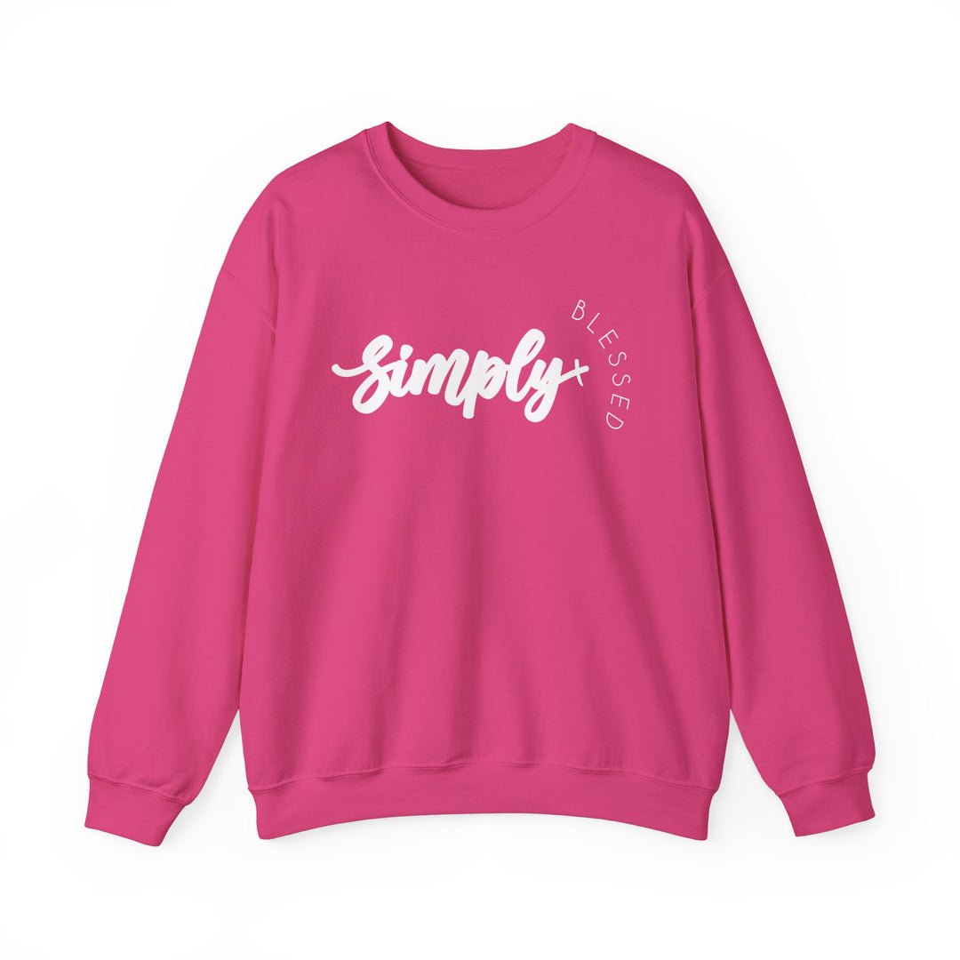 Simply Blessed Crew: A pink unisex sweatshirt featuring white text, designed for comfort with a ribbed knit collar and no side seams, made from a polyester-cotton blend.