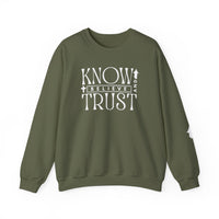 Green crewneck sweatshirt with white Trust, Know, Believe text, featuring a classic fit, ribbed collar, and durable stitching, ideal for casual comfort.