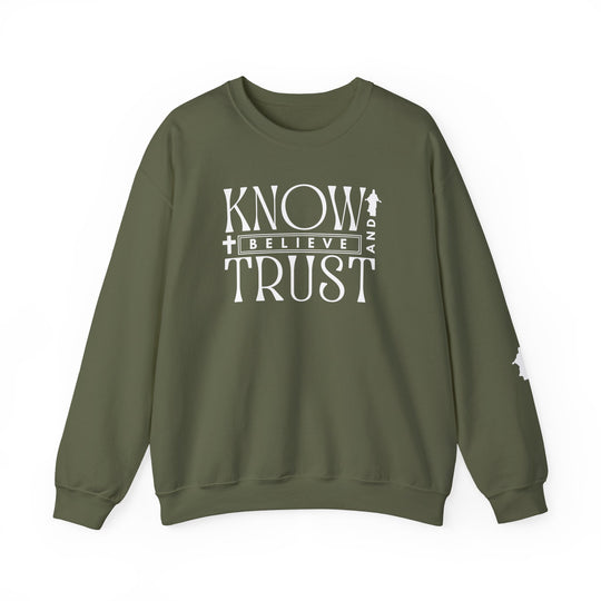 Green crewneck sweatshirt with white Trust, Know, Believe text, featuring a classic fit, ribbed collar, and durable stitching, ideal for casual comfort.