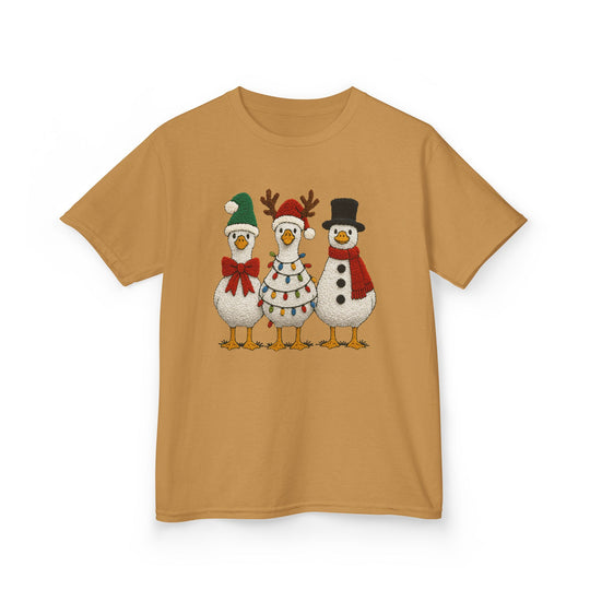 Christmas Geese Kids Tee features three festive birds with holiday accessories on a mustard cotton shirt, ideal for everyday wear.