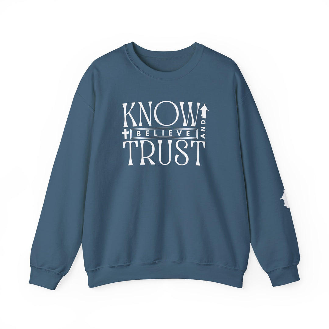 Trust, Know, Believe Crew sweatshirt featuring white text on blue, offering a comfortable, durable fit with a classic crewneck style.