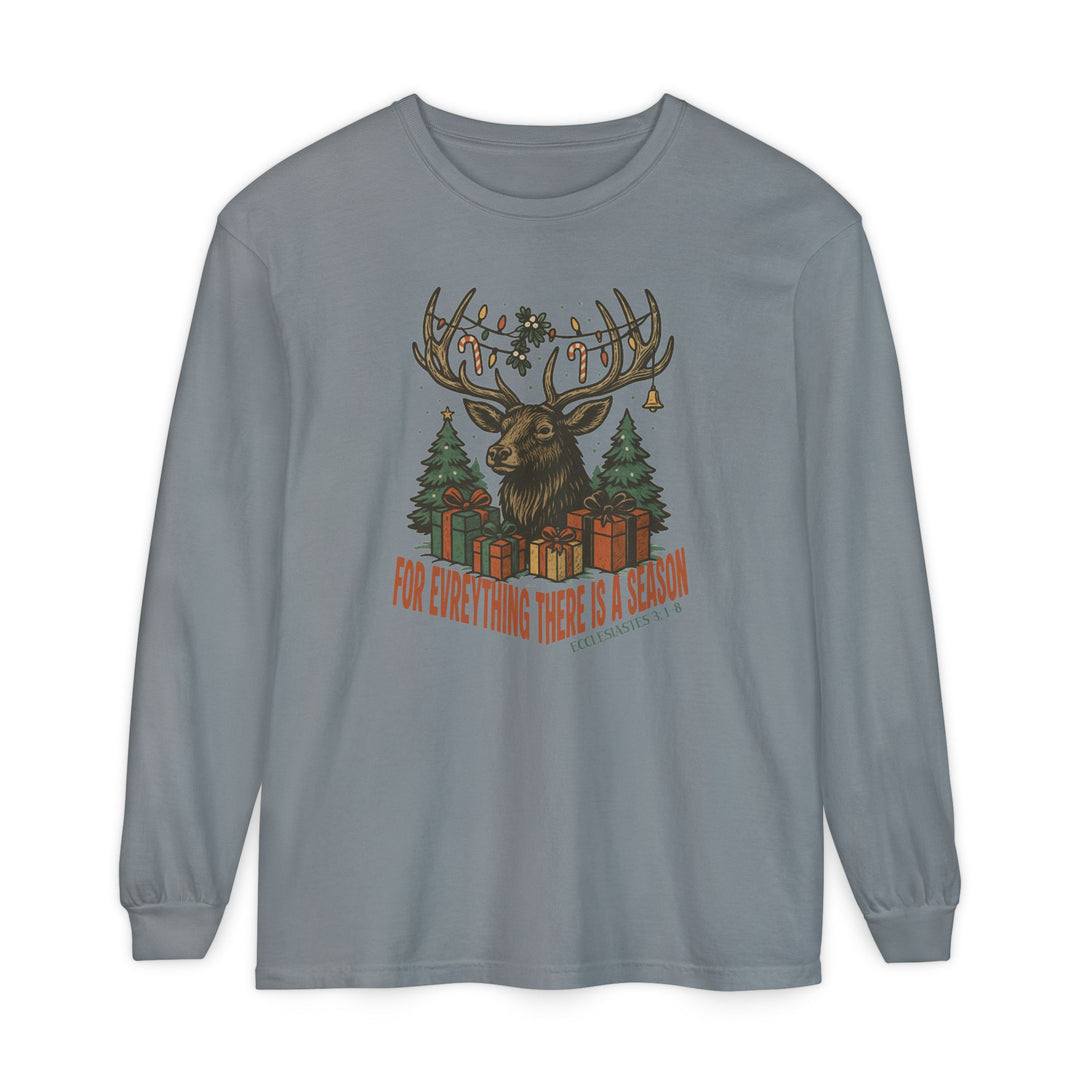 For Everything There is a Season Christmas Long Sleeve Tee featuring a stag with festive antlers, evergreen trees, and gifts, perfect for comfortable holiday wear.