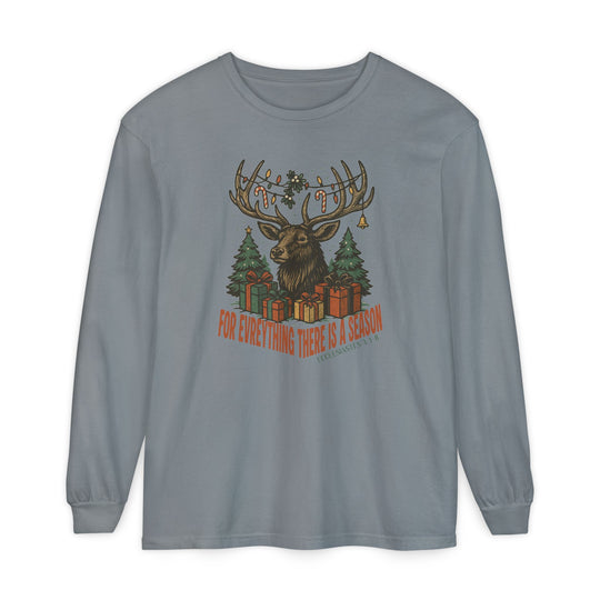For Everything There is a Season Christmas Long Sleeve Tee featuring a stag with festive antlers, evergreen trees, and gifts, perfect for comfortable holiday wear.
