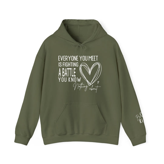 Olive-green pullover hoodie with EVERYONE YOU MEET IS FIGHTING A BATTLE YOU KNOW NOTHING about text and heart graphic on chest, pocket, and sleeve slogan.