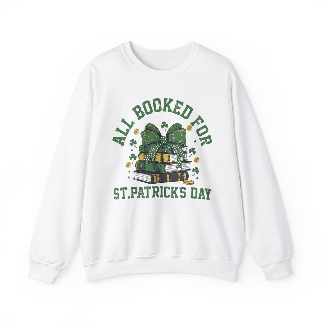 Booked Up for St. Patrick's Day Crew: Unisex white sweatshirt with green text on front, featuring ribbed knit collar, made of cotton-polyester blend for comfort.
