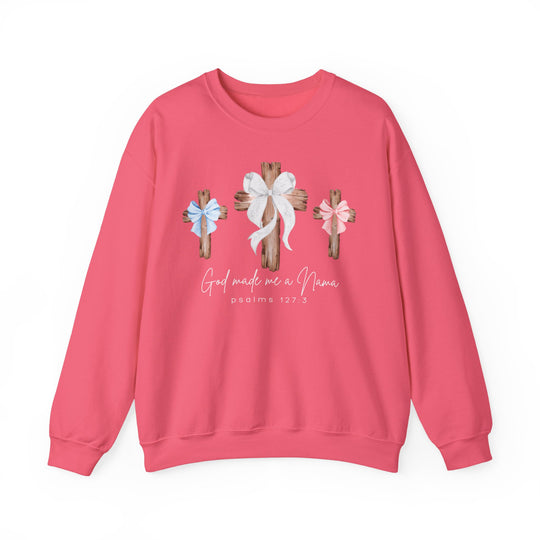 Coral-pink sweatshirt with three wooden crosses, bows, and God made me a Nana text, highlighting Psalms 127:3. Comfortable blend of polyester and cotton.