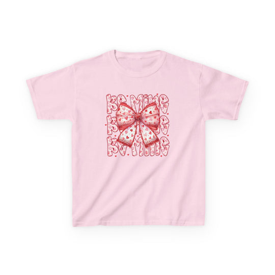 Light-pink Be Mine Kids Tee with a red and pink bow graphic and BE MINE text, featuring tiny heart patterns, ideal for Valentine's Day.