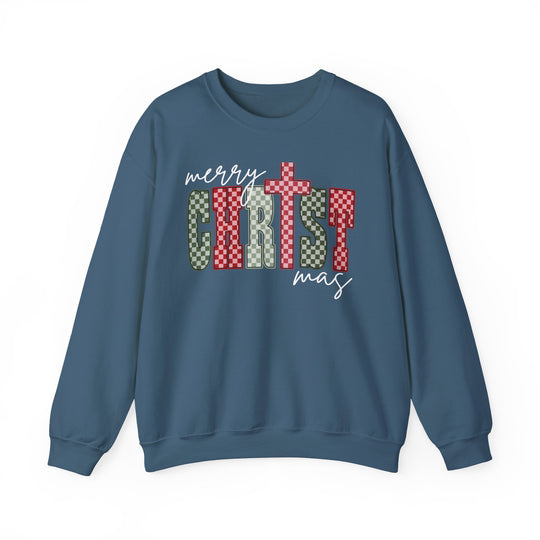 Blue crew-neck sweatshirt featuring merry CHRIST mas with a checkerboard pattern and cross detail, embodying cozy holiday spirit from Faith Family Designs.
