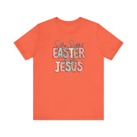Silly Rabbit Easter is for Jesus Tee, featuring colorful polka dot letters on a soft, unisex jersey short sleeve t-shirt with a comfortable fit.