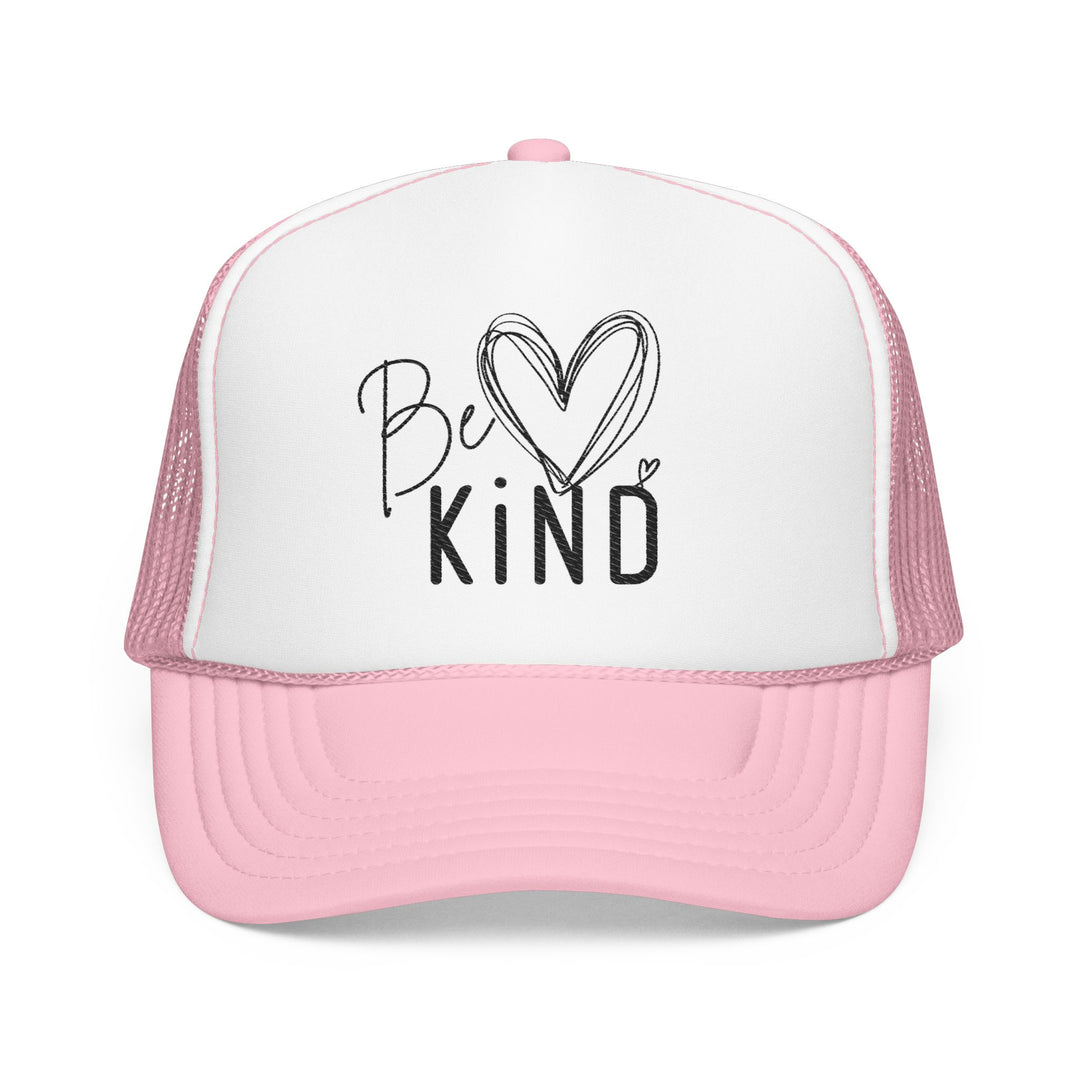 Pink-and-white Be Kind Foam Trucker Hat with heart details, featuring structured design, pre-curved visor, and adjustable fit, embodying Faith Family Designs' trendy, heartfelt style.