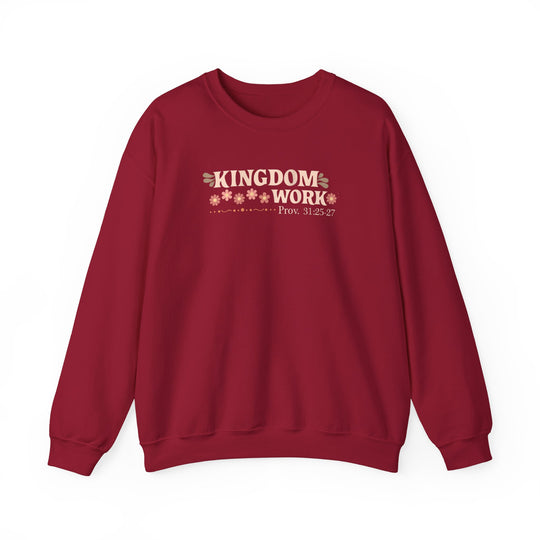 Motherhood Kingdom Work Crew sweatshirt features KINGDOM WORK text and floral motifs, with scripture reference. Ribbed collar, 50/50 cotton-poly blend for comfort.