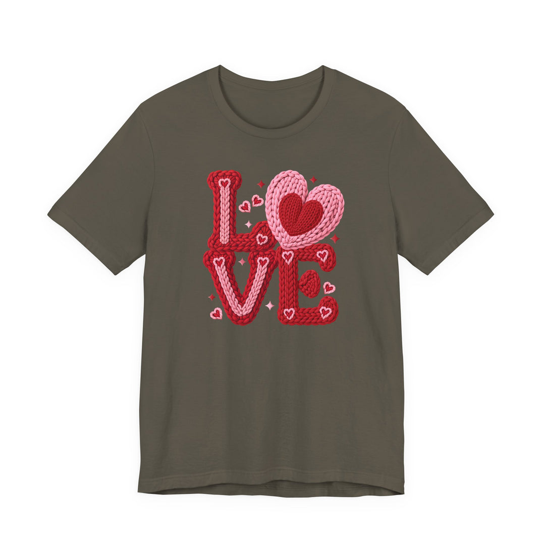 Love Heart Tee features a yarn-style LOVE graphic with a heart-shaped O on an olive tee, adorned with decorative hearts and sparkles.