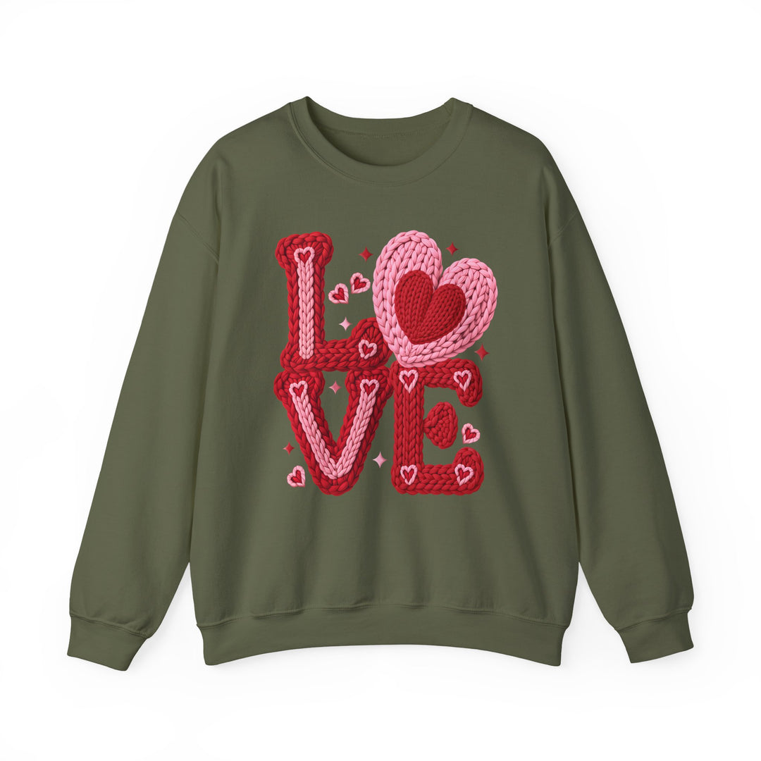 Olive-green crewneck sweatshirt with a LOVE graphic, featuring interlocking heart motifs, designed by Faith Family Designs for a playful, Valentine’s-inspired look.
