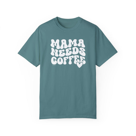 A relaxed-fit Mama Needs Coffee Tee, crafted from 100% ring-spun cotton. Garment-dyed for extra coziness, featuring double-needle stitching for durability and a seamless design for a tubular shape.