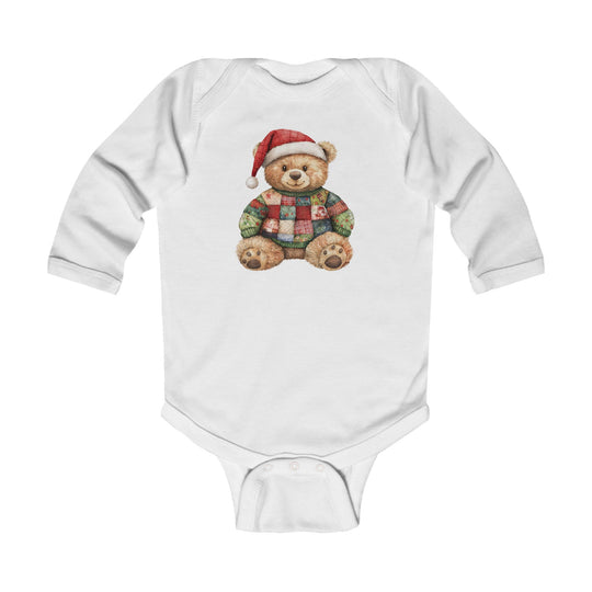 Christmas Bear Onesie: White long-sleeve bodysuit with teddy bear illustration in holiday attire, featuring plastic snaps and ribbed knitting for durability and comfort.