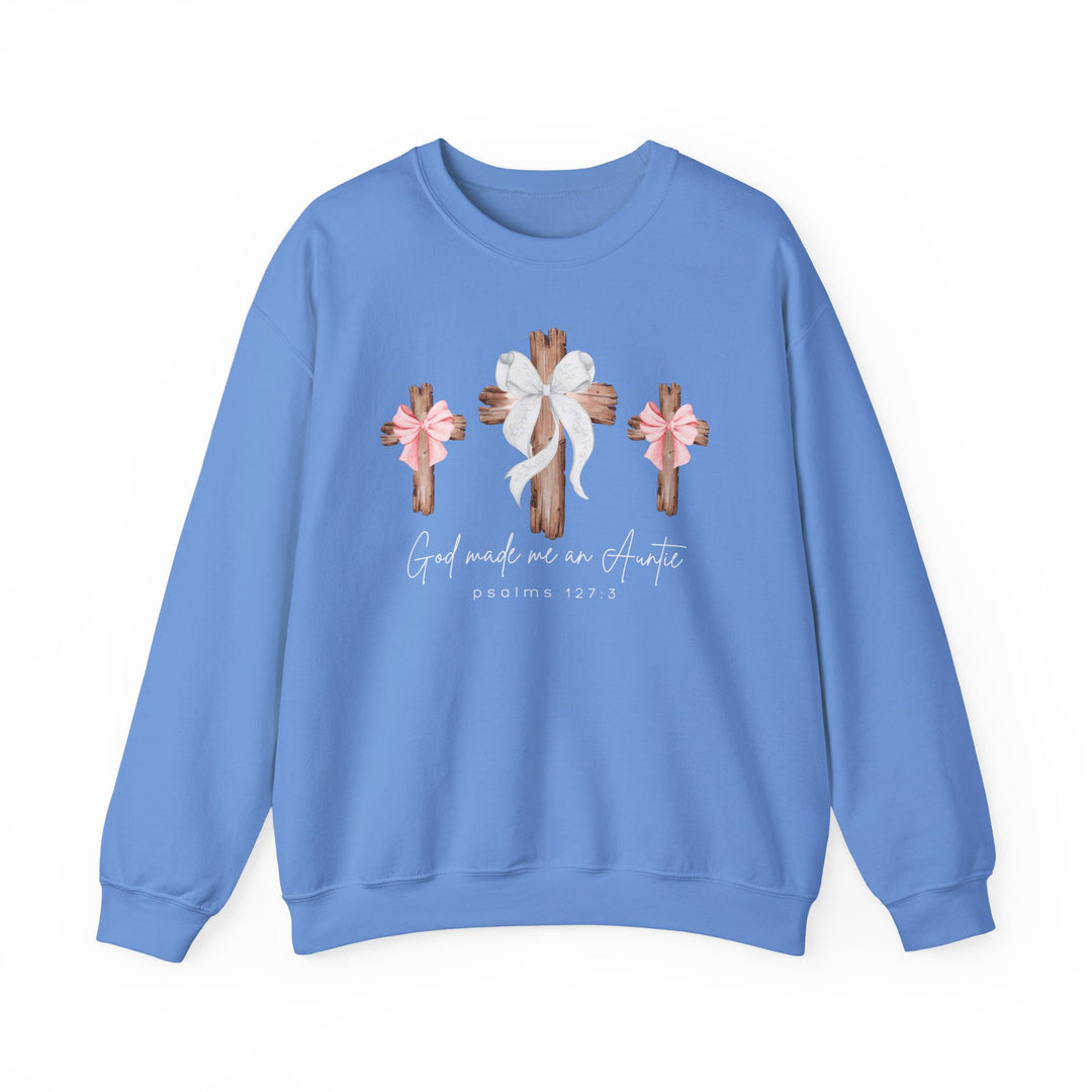 Powder-blue crewneck sweatshirt with three wooden crosses and bows, featuring the phrase God made me an Auntie and Psalms 127:3 below.