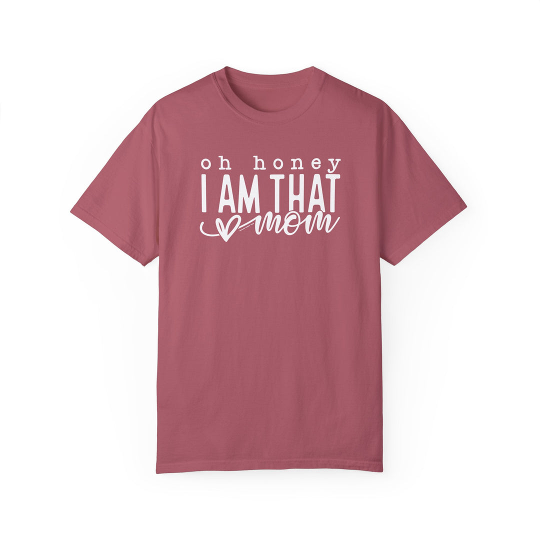 A relaxed fit, garment-dyed tee made from 100% ring-spun cotton. Double-needle stitching for durability and a seamless design for comfort. Title: Oh Honey I'm that Mom Tee.