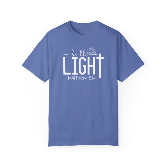 A ring-spun cotton Be the Light Tee, garment-dyed for coziness. Relaxed fit with double-needle stitching for durability. No side-seams for a tubular shape. Sizes S-3XL.
