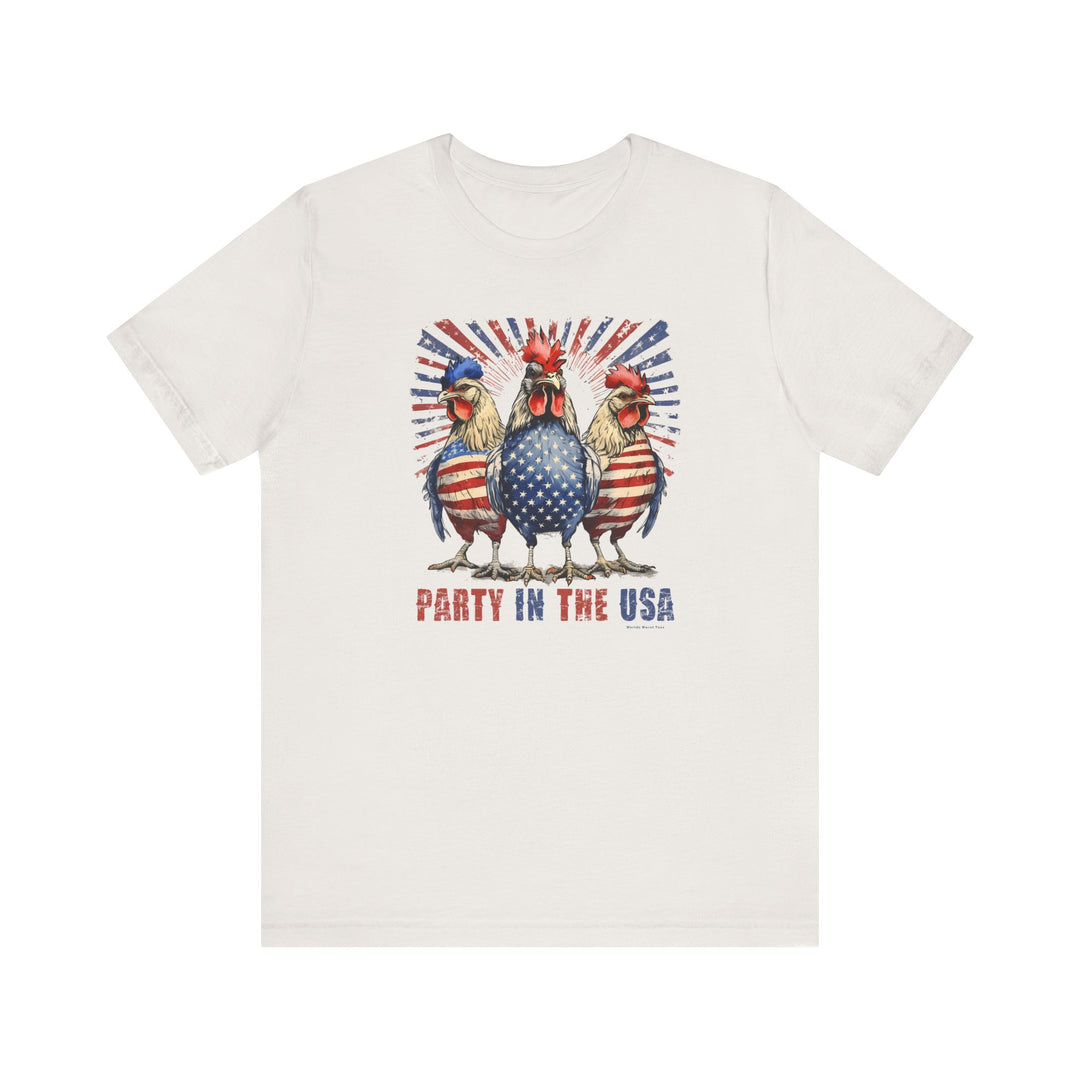 A white t-shirt featuring a whimsical design of roosters and flags, embodying a patriotic theme. Made of soft, 100% Airlume combed cotton with ribbed knit collars for a comfortable fit. From Worlds Worst Tees.